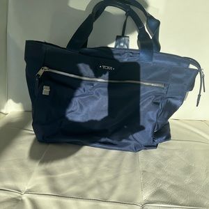 Multiple use Tumi Tote